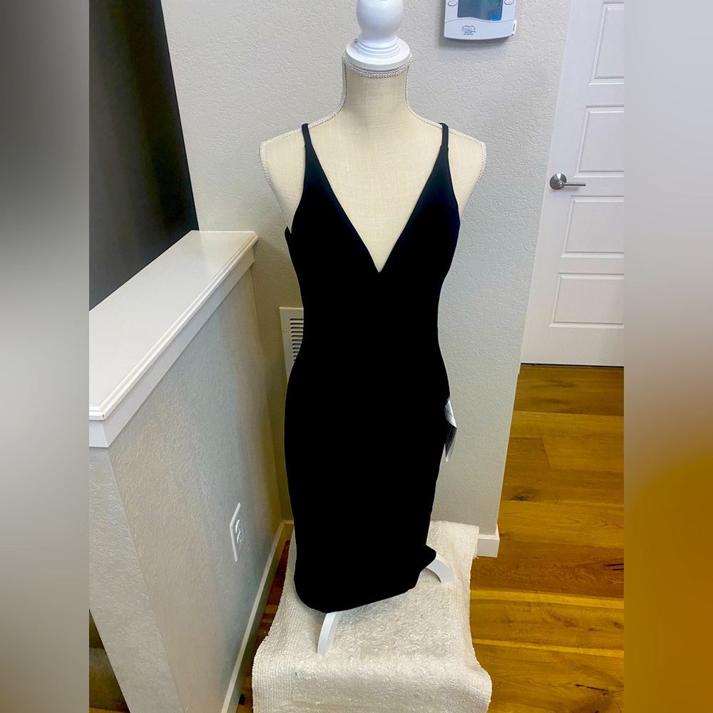 Dress the population black dress.